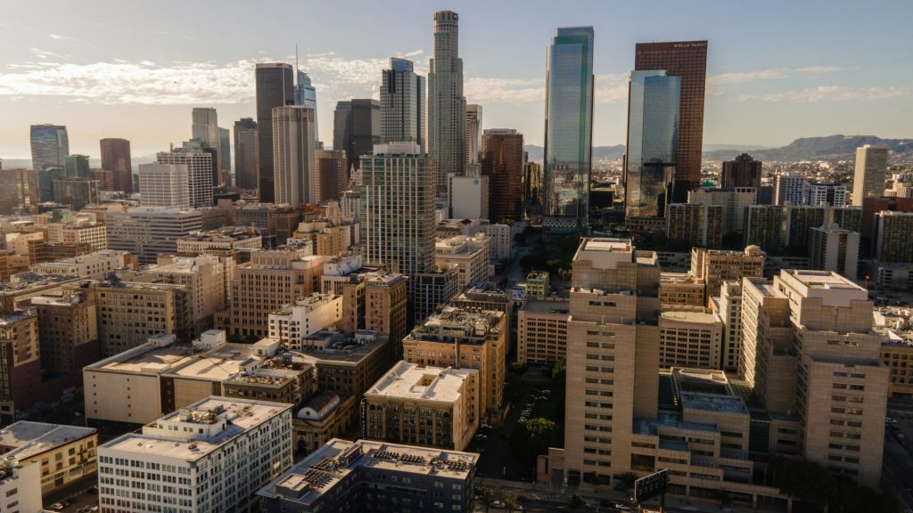 Aerial view of the Los Angeles skyline during sunset, the setting for many a business litigation lawyer in LA.